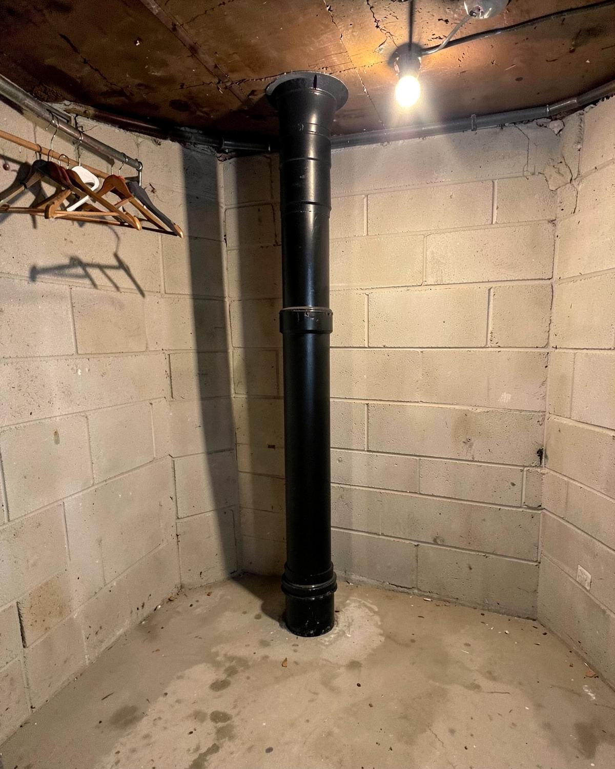 Finished copper main stack in joist bay